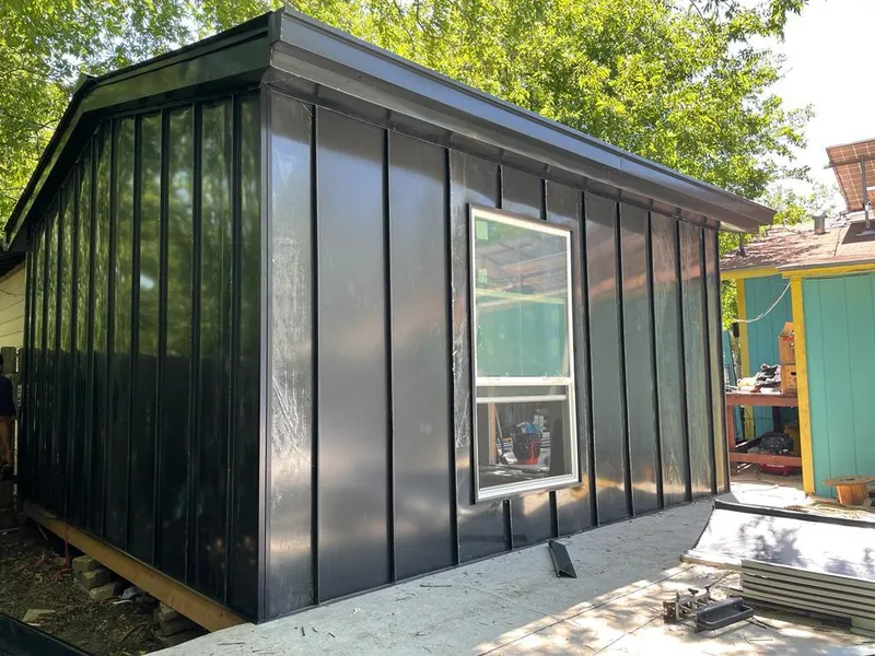 Black standing seam metal wall panels for Metal Roof Installation in Marshall