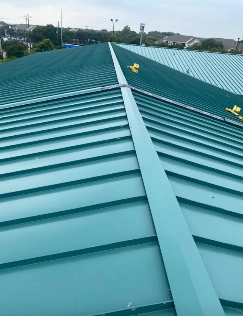Green commercial metal roof ridge and valley for Metal Roof Repair in Marshall